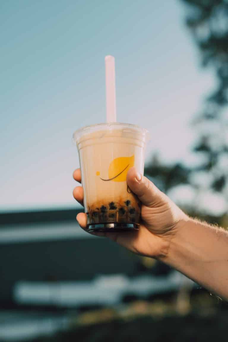 hand holding boba tea