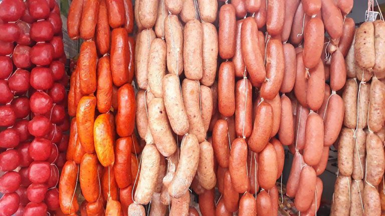 chorizos at a market